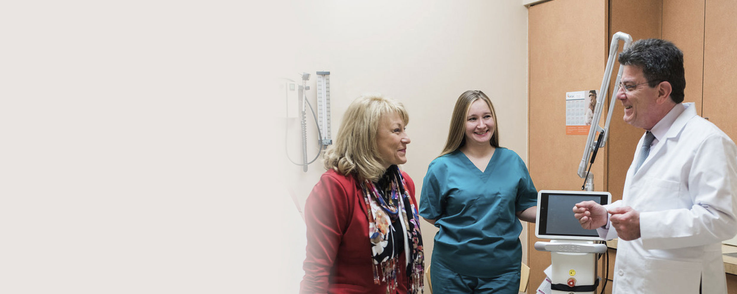 Photo of Dr. Kamal Hamod talking to a patient about pelvic pain